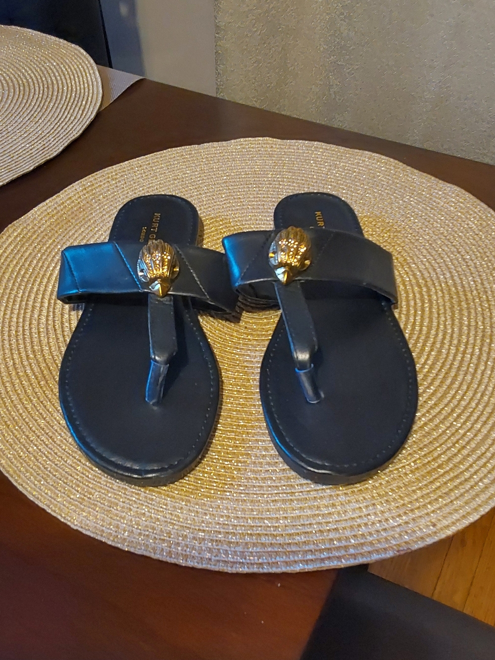 Kurt Geiger Black Leather Thong Sandals with Gold Shell Detail